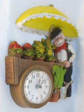 70s vintage Burwood plastic wall clock flower vendor push cart peddler