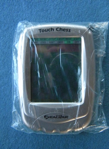Excalibur Touch Chess model 404 hand held game w/case and manual unused