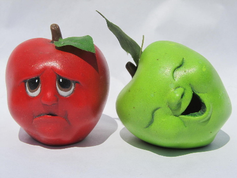 Funny face 70s vintage ceramic fruit characters, smiling and laughing