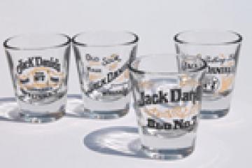 Jack Daniels shot glasses set w/ old whiskey labels, Jack Daniel's logos
