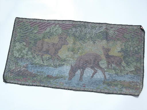 Kitschy vintage wall hanging tapestry, baby deer or elk in mountain stream