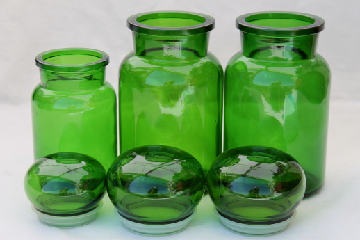 Mod vintage green glass kitchen canisters, airtight seal apothecary jars canister set
