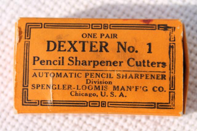 old antique Dexter pencil sharpener gear wheels in original vintage packaging