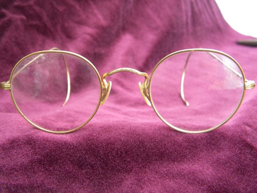 Old antique gold rimed spectacles or eyeglass frames, vintage Artcraft
