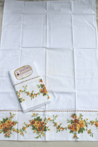 Pair of vintage cotton pillowcases w/ paper Springmaid label, rose bouquet print