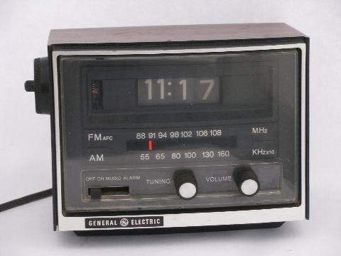 Retro 1970s flip number vintage GE alarm clock AM/FM radio with rotating digits