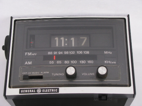 Retro 1970s flip number vintage GE alarm clock AM/FM radio with rotating digits