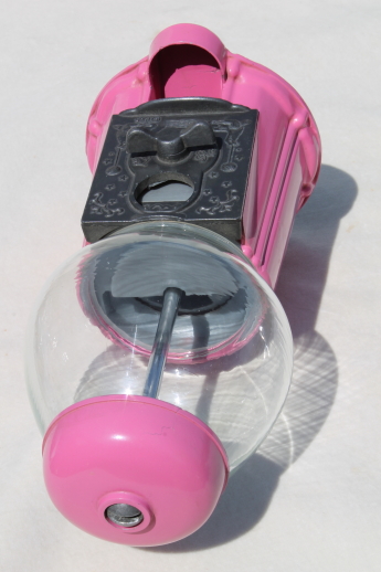 Retro 80s vintage gumball machines, coin-op candy dispensers so pretty in pink!