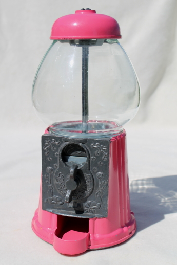 Retro 80s vintage gumball machines, coin-op candy dispensers so pretty in pink!