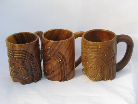 Retro carved wood tiki cups, Hawaiian or South Pacific wooden masks