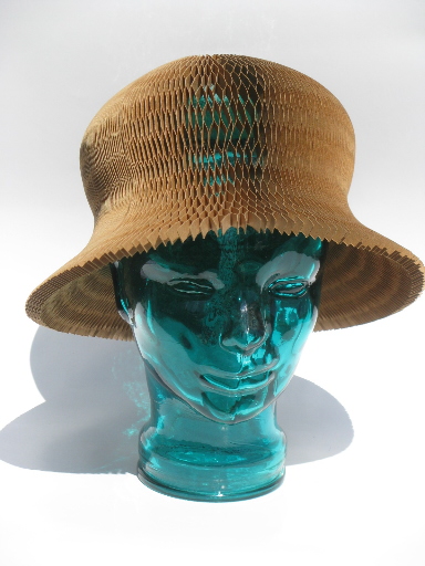 Retro eco-friendly brown paper vase becomes accordian fold flip-flop sun hat!