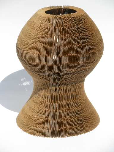 Retro eco-friendly brown paper vase becomes accordian fold flip-flop sun hat!