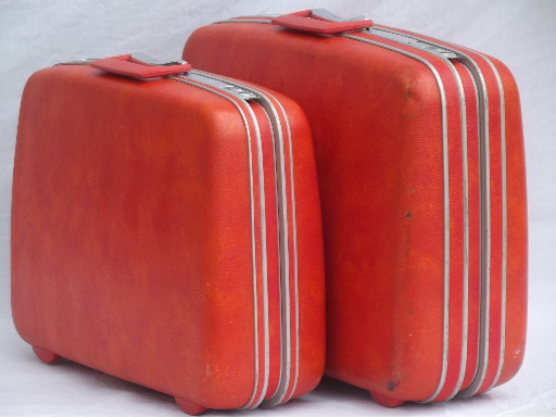 Retro orange Samsonite hard sided suitcases, vintage luggage set