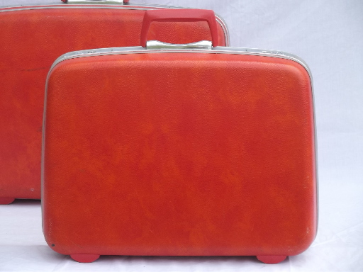 Retro orange Samsonite hard sided suitcases, vintage luggage set