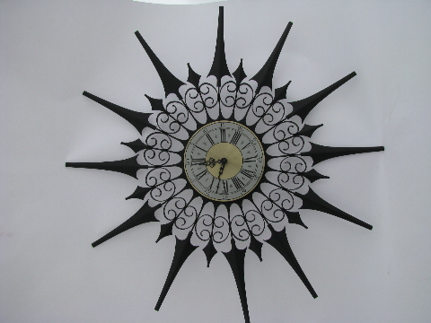 Retro vintage black metal atomic starburst clock, gothic mod