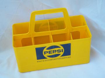 Retro yellow plastic carrier rack for old glass Pepsi soda bottles