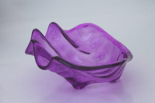 Sea shell shaped plastic salad bowls for a luau or tiki party, ocean blue & purple