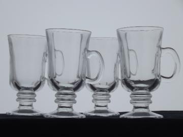 Tall cups for Irish coffee, set of four clear glass footed mugs