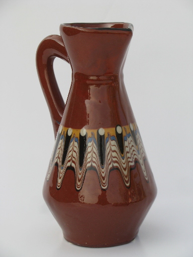 Troyan pottery pitcher and glasses, Bulgarian redware w/ colored glazes