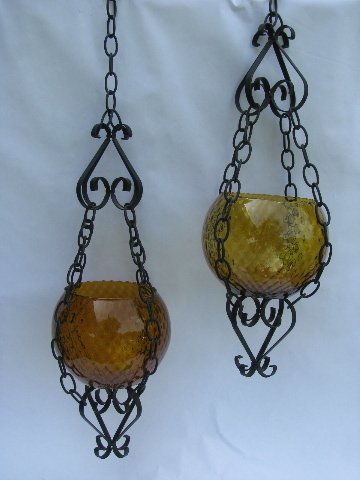 Vintage iron hanging planters w/ Italian blown glass globes in amber