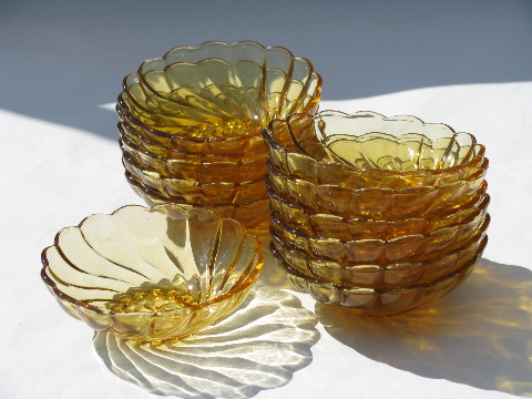 12 amber glass fruit or salad bowls, Colony swirl, 60's-70's vintage