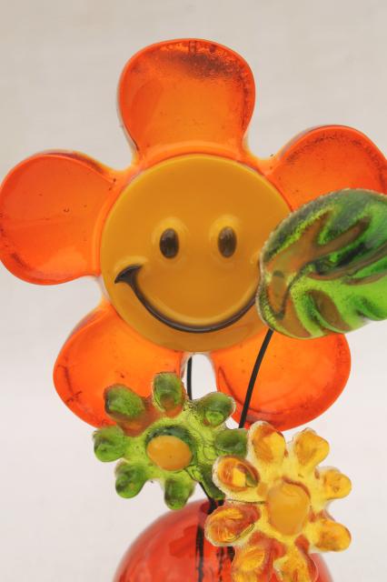 70s happy smiley face daisy paperweight, mod vintage colored lucite plastic flowers