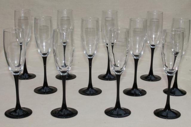 https://1stopretroshop.com/item-photos/Cristal-dArques-black-stem-crystal-champagne-flutes-set-of-12-vintage-glasses-1stopretroshop-z65248-1.jpg