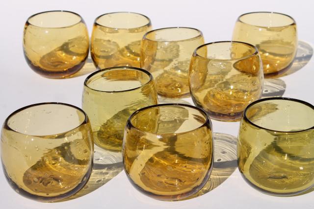 Mexican hand blown amber glass roly poly drinking glasses, retro short fat round tumblers