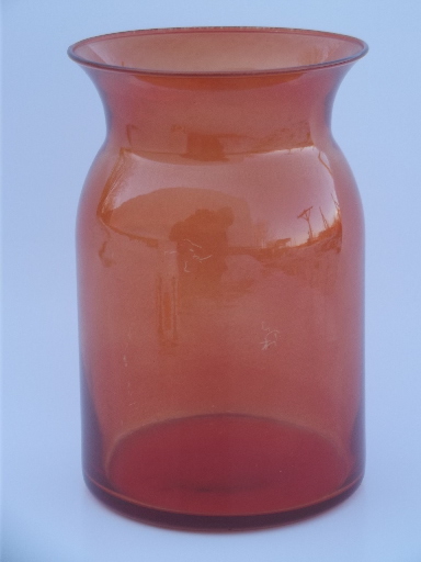 Big glass jar for collection display or vase, rich orange tinted color