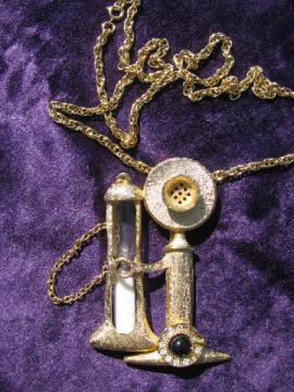 Big retro pendant necklace, hourglass pay phone timer, vintage candlestick telephone