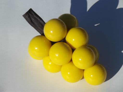 Bunch of  yellow lucite grapes on driftwood, retro 60s 70s vintage