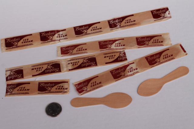 collection of old ice cream spoons, long handled soda fountain spoons, dixie cup wood spoons