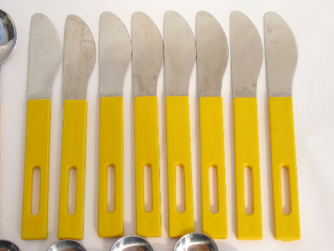 Danish modern vintage stainless flatware, mod yellow plastic handles, set for 8