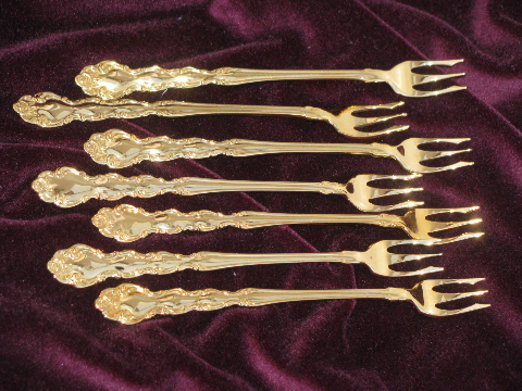 Gold plated Beethoven Oneida flatware for 8+, serving pieces, oyster forks