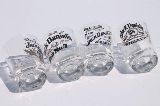 Jack Daniels shot glasses set w/ old whiskey labels, Jack Daniel's logos