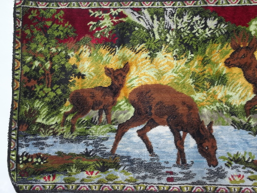 Kitschy vintage wall hanging tapestry, baby deer or elk in mountain stream