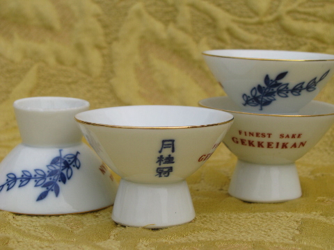 Lot assorted porcelain sake cups and jar bottles, vintage Japan