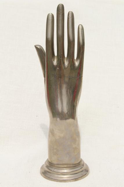 machine age vintage cast metal hand form, art deco glove or ring display gunmetal silver tone