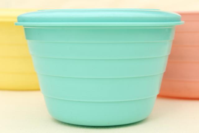 mid-century vintage Stanhome plastic bowls, aqua yellow pink Tupperware style containers