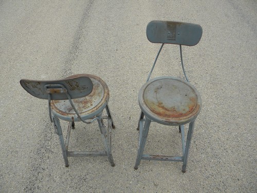 Pair of industrial machine-age vintage metal studio loft or factory shop stools