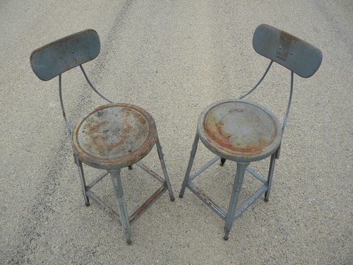 Pair of industrial machine-age vintage metal studio loft or factory shop stools