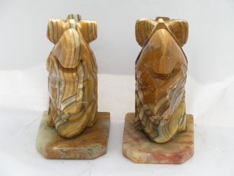 Pair of vintage carved Mexican onyx stone book ends, Indian heads