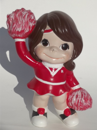 Retro big eyed kids ceramic figures football hero and cheerleader girl