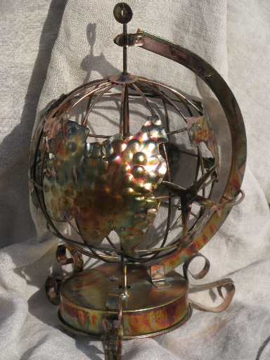 Retro metal art sculpture, whole world globe music box, turns and plays