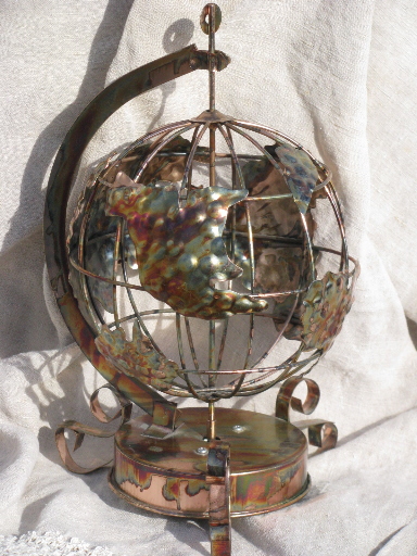 Retro metal art sculpture, whole world globe music box, turns and plays