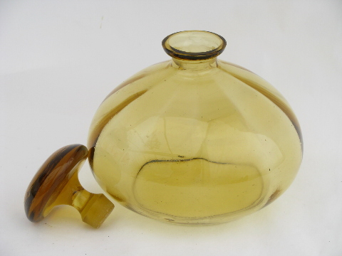 Retro mid-century modern blown glass decanter bottle, amber roly-poly