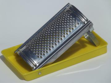 Retro vintage yellow plastic folding tray grater for kitchen or camper
