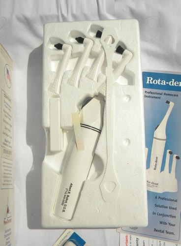 Rota-dent professional rotary toothbrush factory sealed w/extra heads