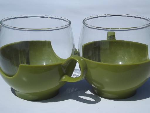 Vintage 70s Pyrex roly-poly glasses in lime green plastic cup holders