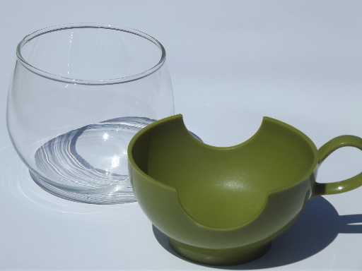 Vintage 70s Pyrex roly-poly glasses in lime green plastic cup holders